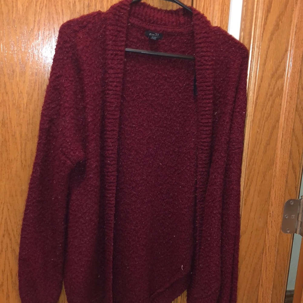 A maroon sweater